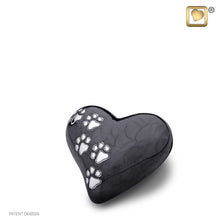 Load image into Gallery viewer, brass lovepaws pet cremation heart urn with paw prints midnight finish 3 cu in
